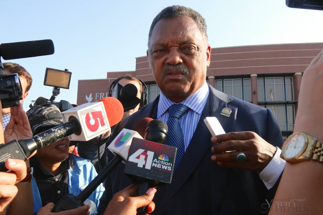 Civil rights activist Jesse Jackson gives an interview before entering the Friendly Temple Missionary Baptist Church in St Louis, Missouri, on Monday, August 25, 2014, to attend the funeral service for Michael Brown. He says that "everybody deserves equal protection before the law." (Yann Schreiber)
