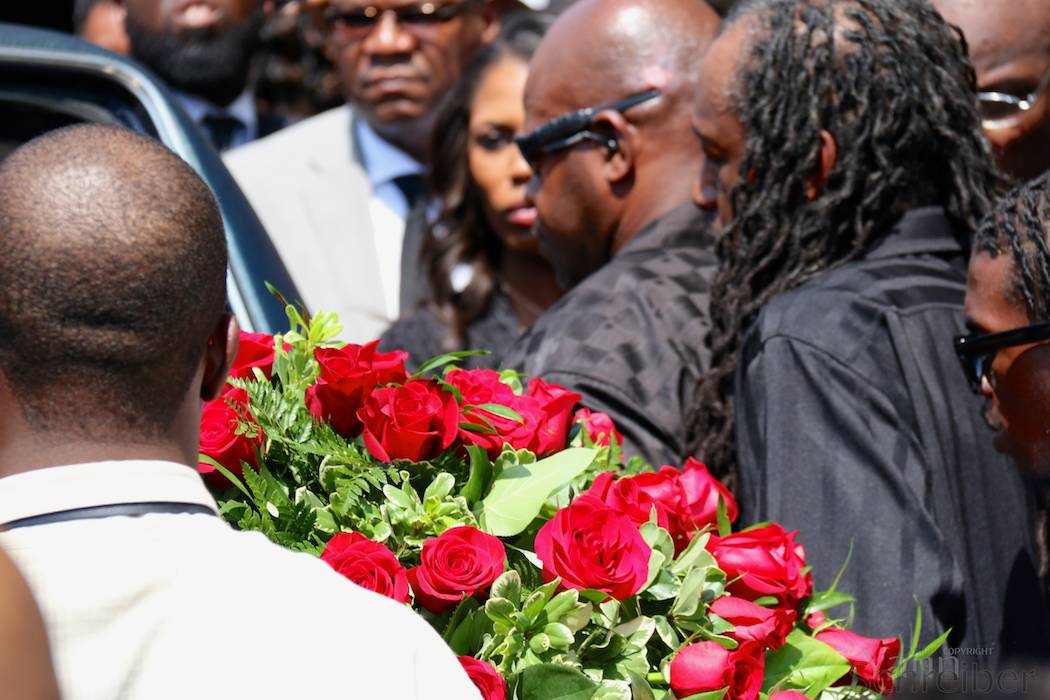 The coffin of Michael Brown gets carried away, MO, Monday, August 25, 2014, after the funeral service dedicated to the Ferguson teenager. The service, held in the Friendly Temple Missionary Baptist Church, attracted thousands, including civil rights figures Al Sharpton and Jesse Jackson. (Yann Schreiber)